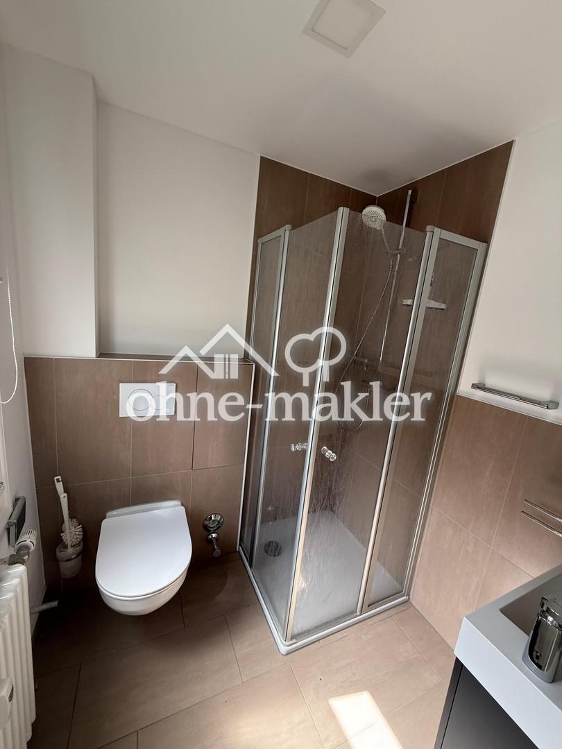 Schöne Single-/Pärchen-Wohnung (2 Zi/Kü/Bad) in zentraler Kurparklage - Photo 2