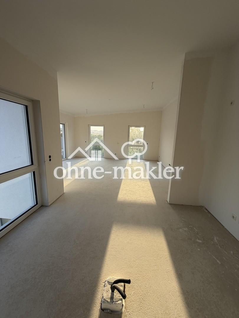 Ländliche Ruhe trifft moderne Eleganz-Exklusive Neubauwohnung im ersten Obergeschoss - Foto 1