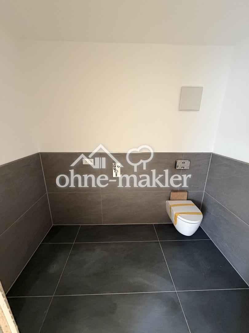 Ländliche Ruhe trifft moderne Eleganz-Exklusive Neubauwohnung im ersten Obergeschoss - Foto 2