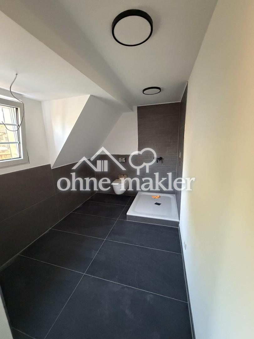 Ländliche Ruhe trifft moderne Eleganz-Exklusive Neubauwohnung im ersten Obergeschoss - Foto 3