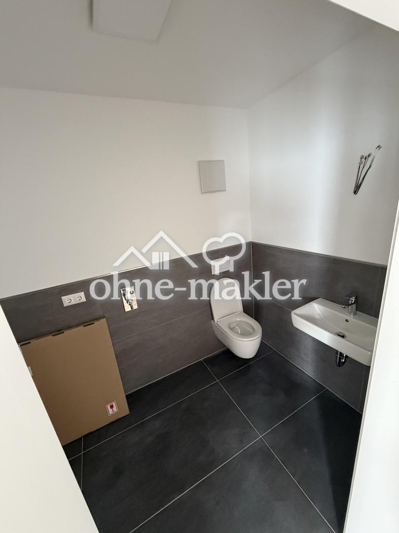 Ländliche Ruhe trifft moderne Eleganz-Exklusive Neubauwohnung im ersten Obergeschoss - Photo 3