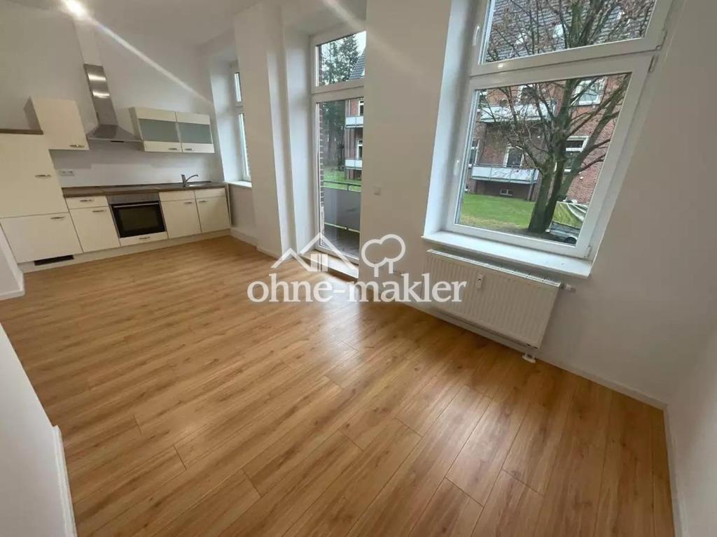 Hochparterre-Wohung mit großzügiger Wohnküche und Balkon - Foto 2