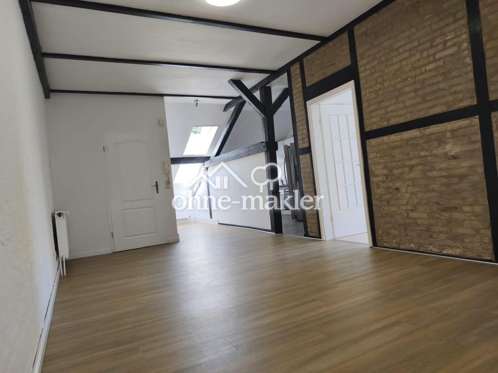 Charmante 3-Zimmer-Dachgeschosswohnung mit Garten – nur 2 Minuten zum Banter See - Photo 1