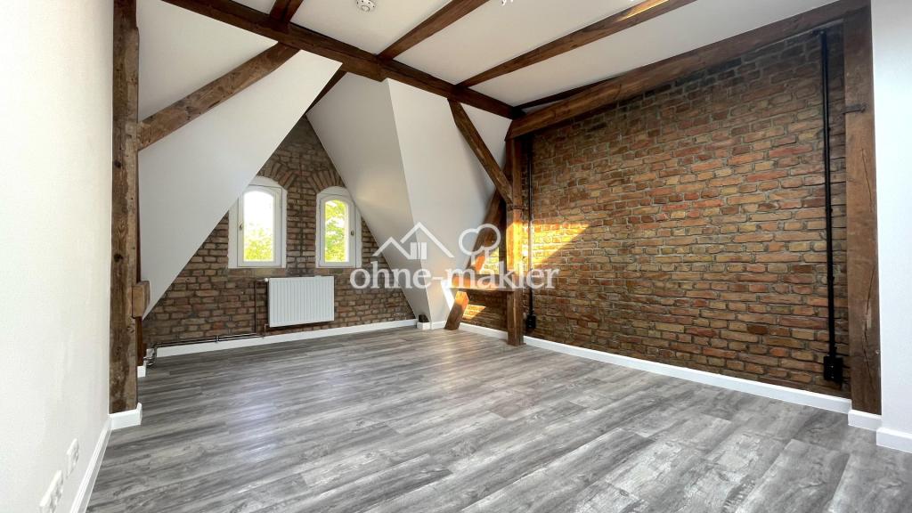 Erstbezug: Maisonette-Wohnung mit Loft-Charakter und großem Garten - Photo 4