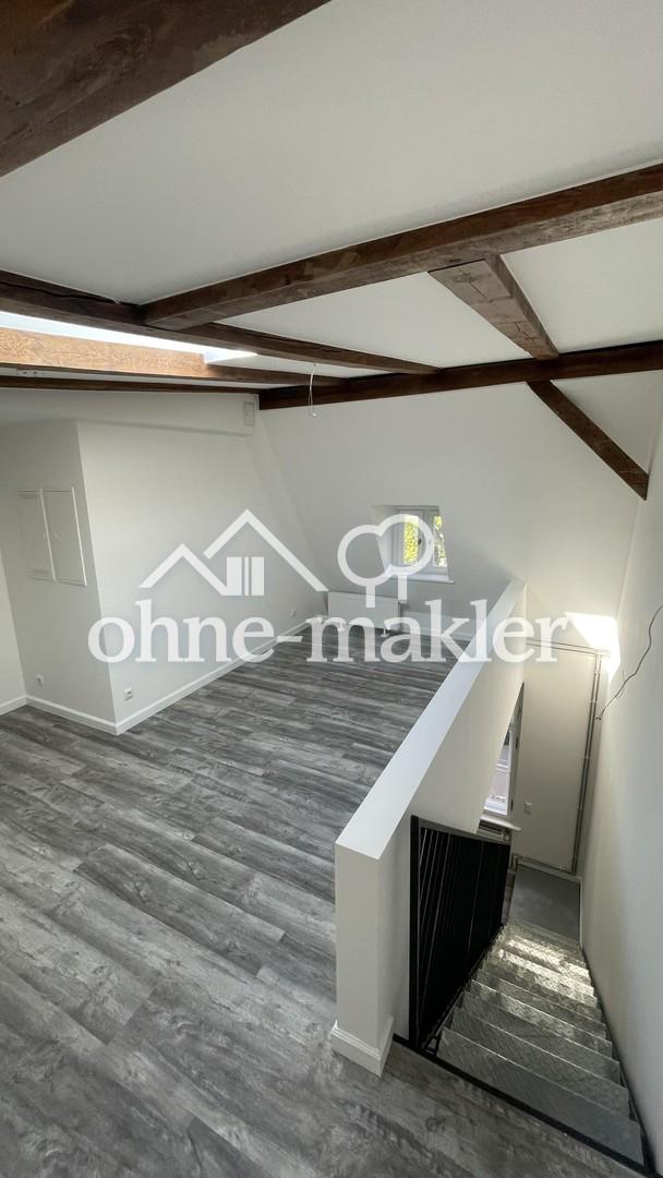 Erstbezug: Maisonette-Wohnung mit Loft-Charakter und großem Garten - Photo 5