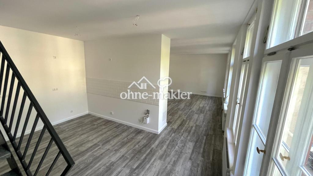 Erstbezug: Maisonette-Wohnung mit Loft-Charakter und großem Garten - Photo 1