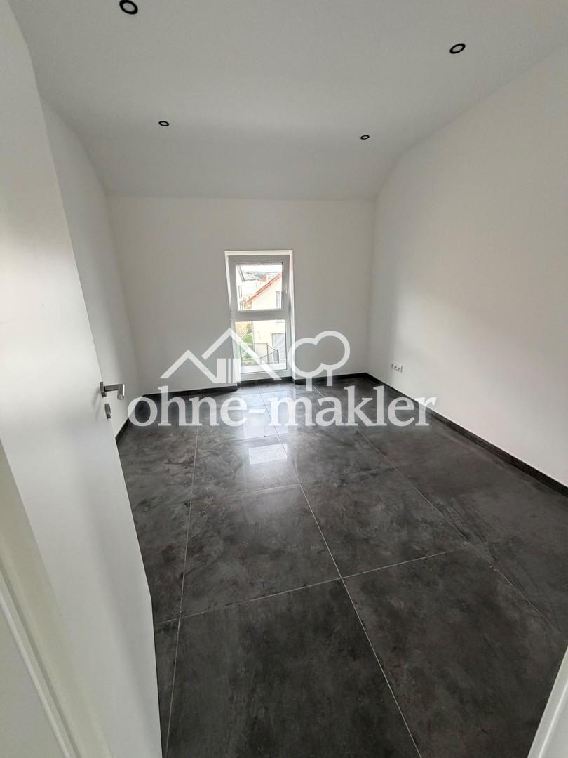 Moderne 4-Zimmer-Neubauwohnung mit Einbauküche, Balkon und Stellplatz in Rodenbach - Foto 1
