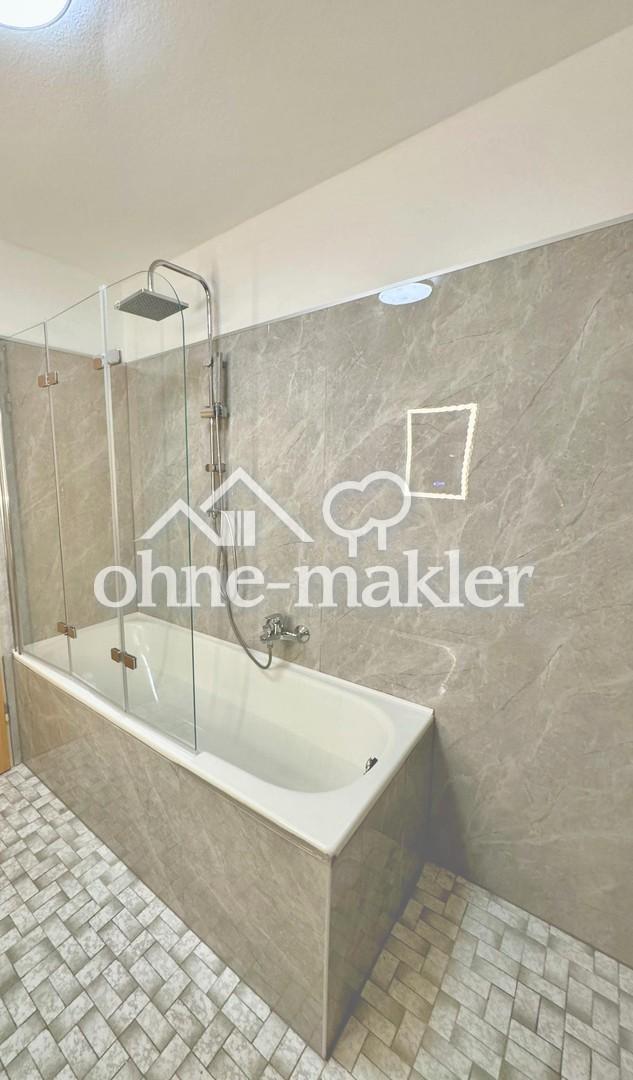 Frisch renoviert: Helle 2,5-Zimmer-Dachgeschosswohnung mit Balkon, Stellplatz & Weitblick - Foto 4