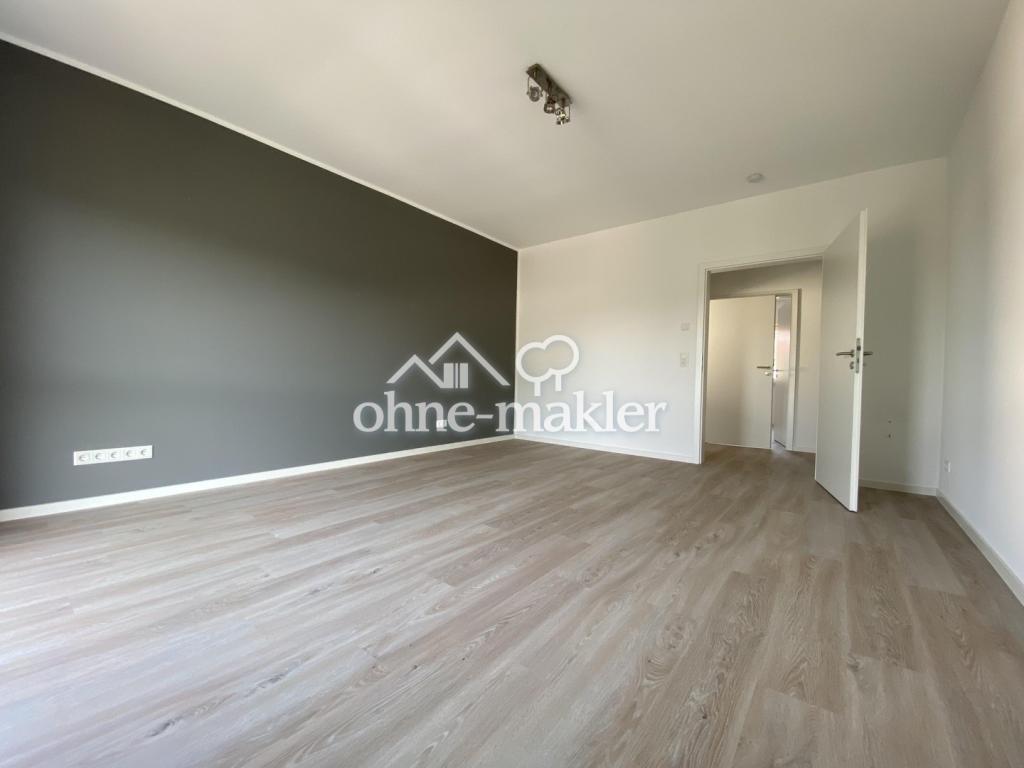 Exklusive Penthousewohnung mit großer Dachterrasse, EBK & Garage in Marburg-Cappel - Photo 1