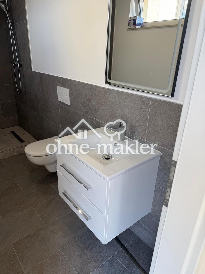 Erstbezug! Neue 2-Zimmer Wohnung in Rüdesheim mit Einbauküche & Terrasse - Photo 2