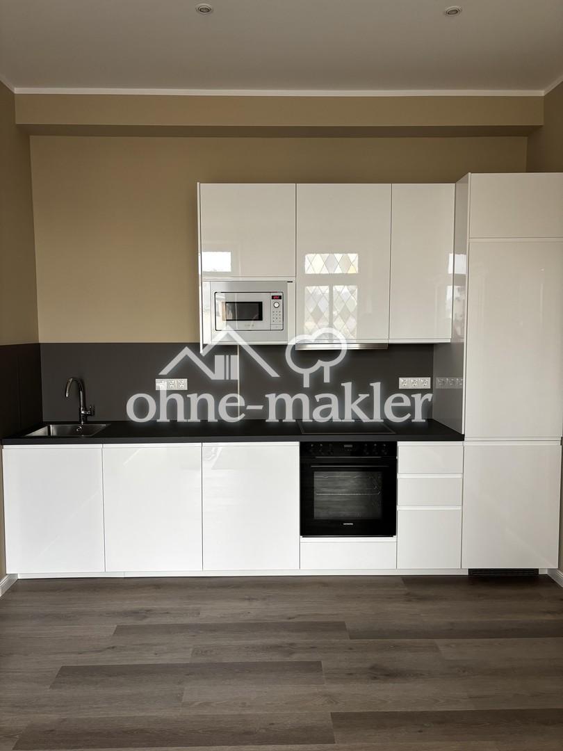 Erstbezug! Neue 2-Zimmer Wohnung in Rüdesheim mit Einbauküche & Terrasse - Photo 1