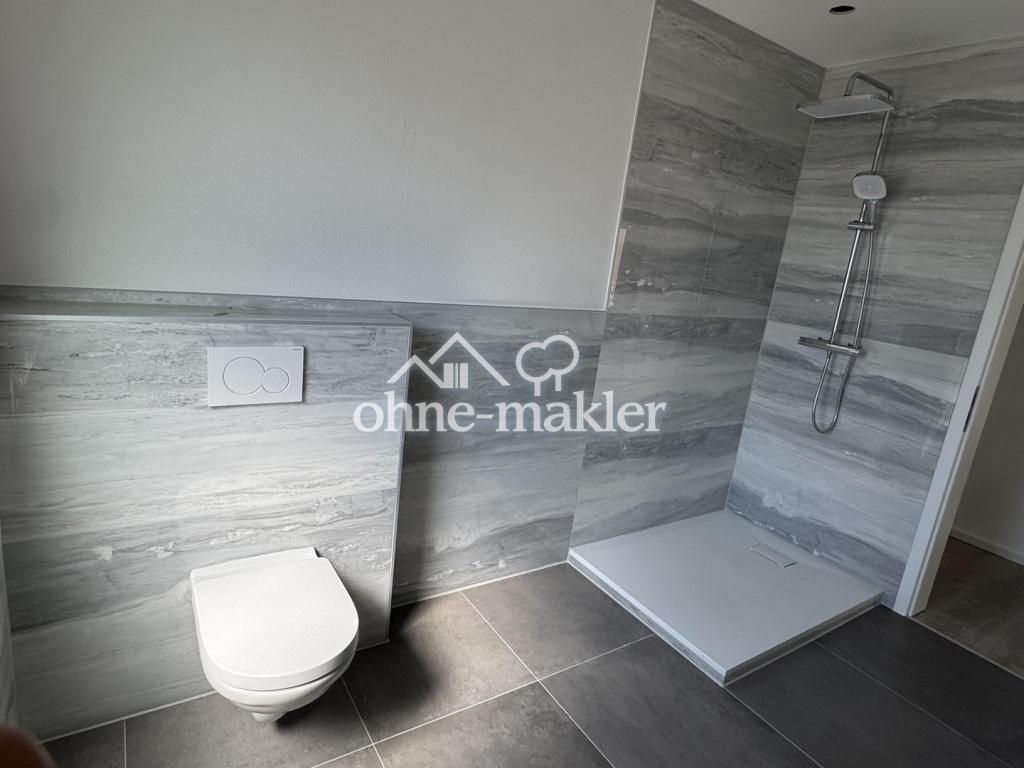 Erstbezug: Helle 2-Zimmer-Wohnung mit Garten, Garage und Fußbodenheizung - Foto 1