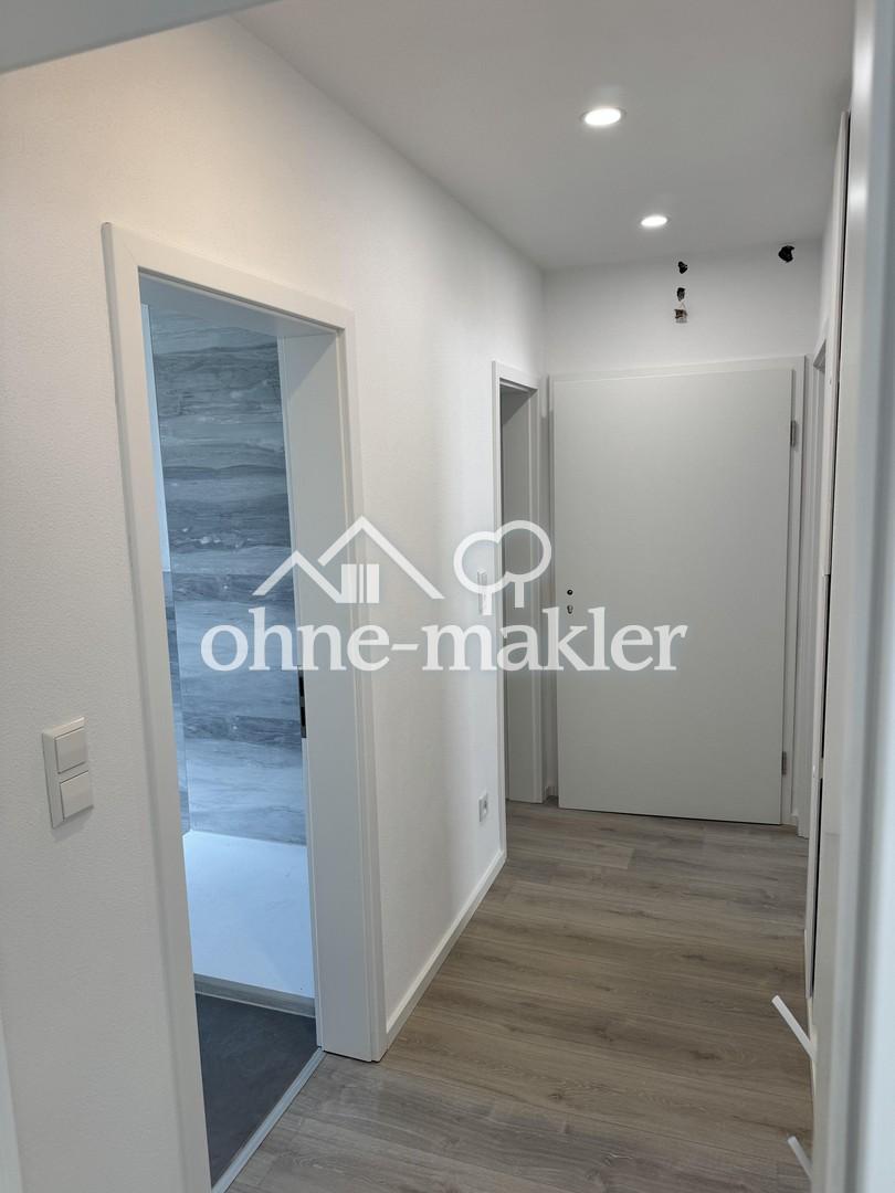 Erstbezug: Helle 2-Zimmer-Wohnung mit Garten, Garage und Fußbodenheizung - Photo 4