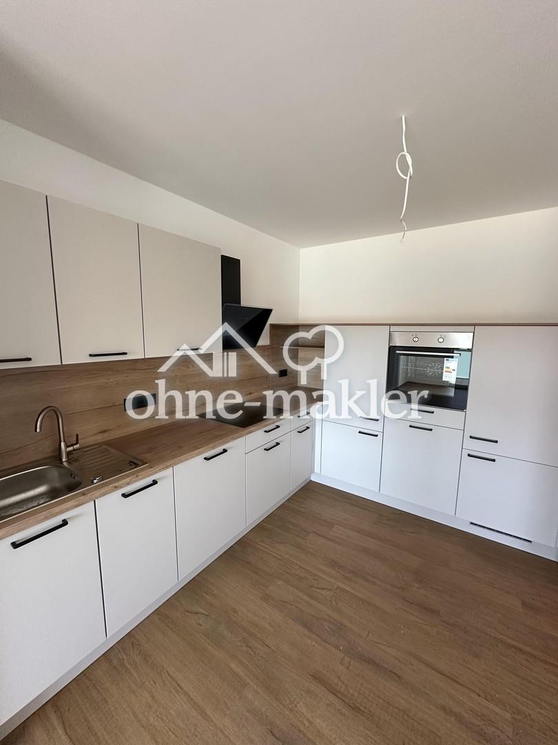 Neubau - Erstbezug - Wunderschöne 2 ZW inkl. EBK und TG Stellplatz! - Foto 3
