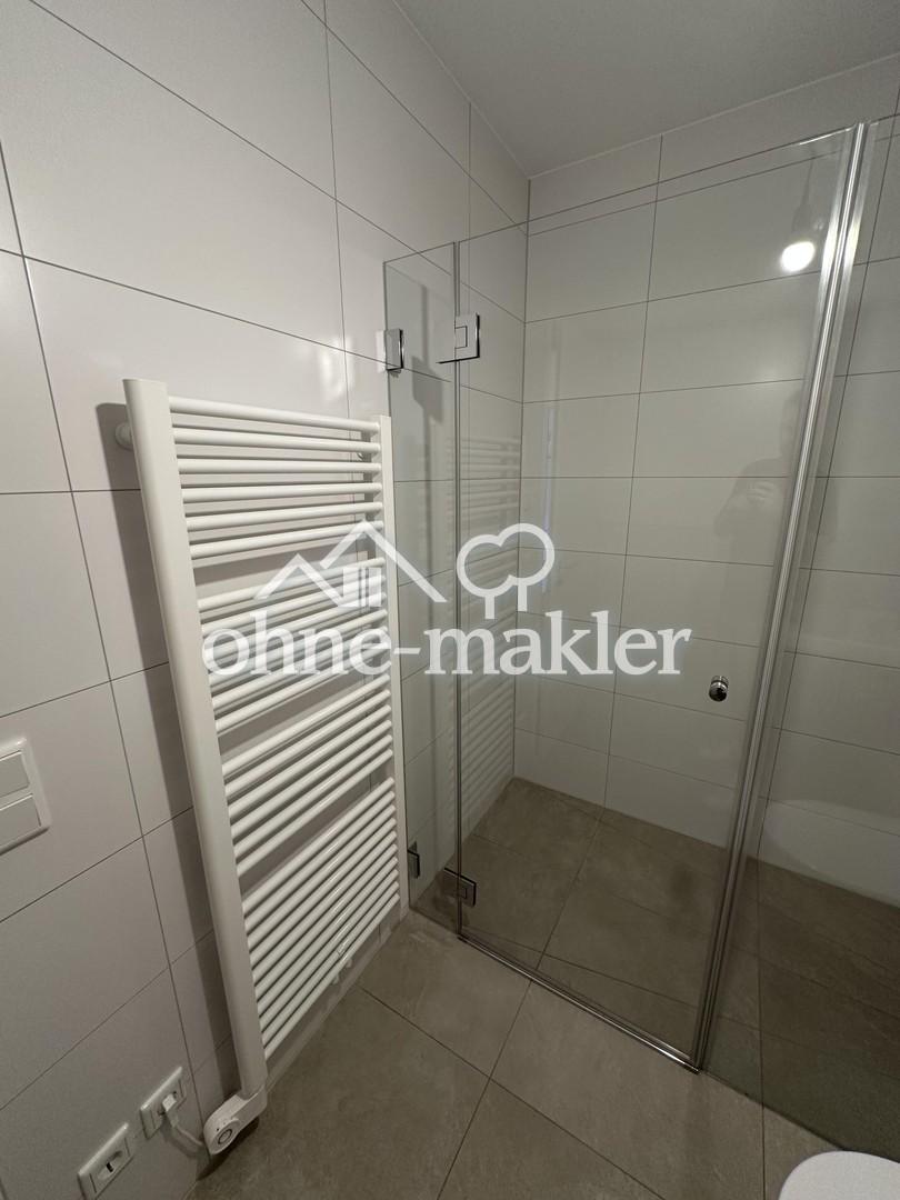 Neubau - Erstbezug - Wunderschöne 2 ZW inkl. EBK und TG Stellplatz! - Foto 4