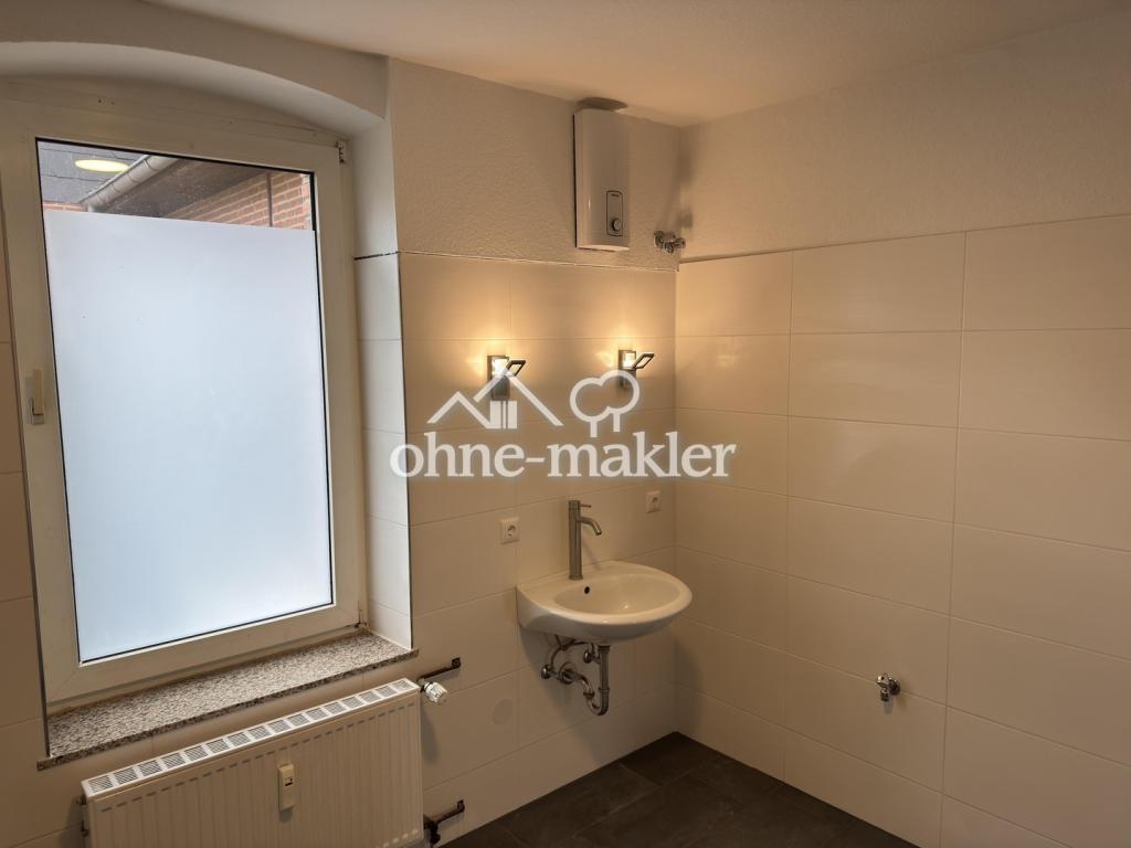 Helle und renovierte 2,5-Zimmer-Wohnung mit Terrasse und Kamin in Wiedensahl - Photo 2