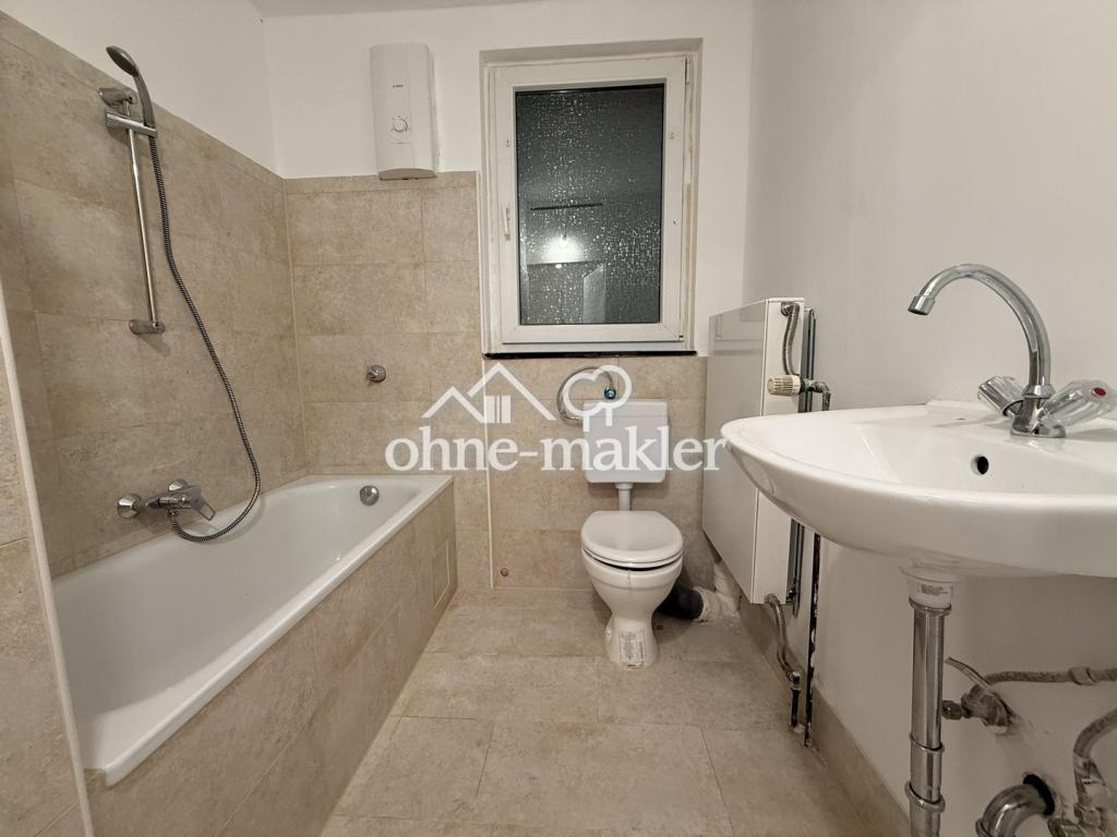 Erstbezug nach Renovierung: 2 Zimmer, neue Einbauküche, Loggia und Gartenmitbenutzung - Foto 3