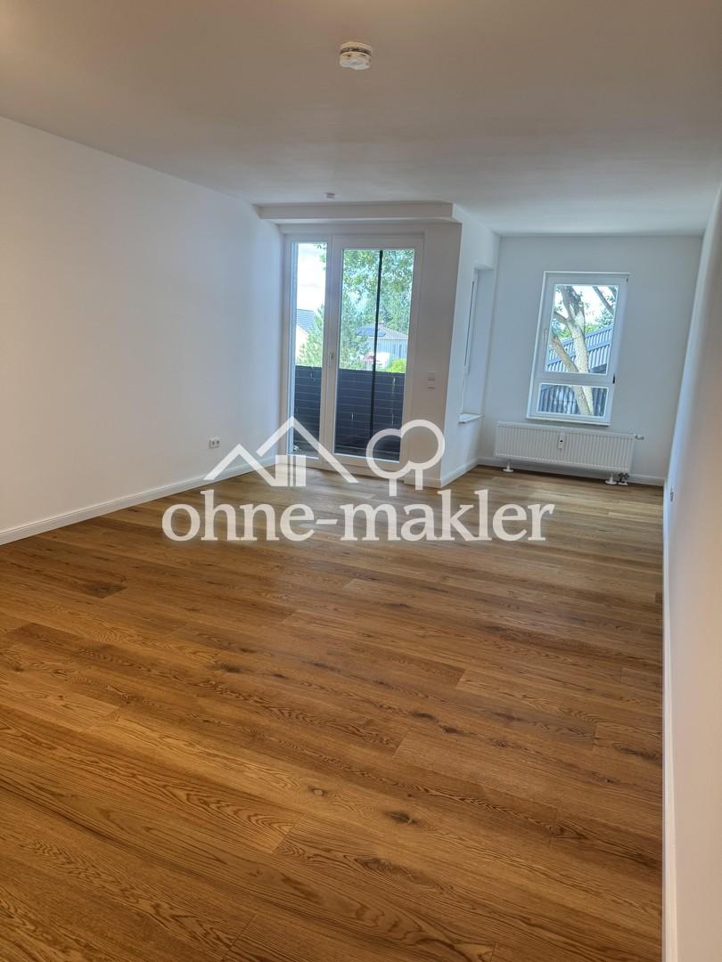 Komplett sanierte 2-Zimmer-Wohnung mit Balkon, Einbauküche und Tiefgaragen-Stellplatz - Foto 1