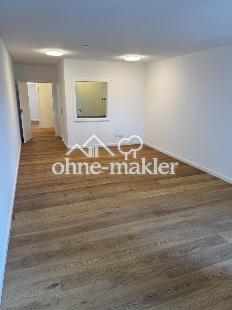 Komplett sanierte 2-Zimmer-Wohnung mit Balkon, Einbauküche und Tiefgaragen-Stellplatz - Foto 2