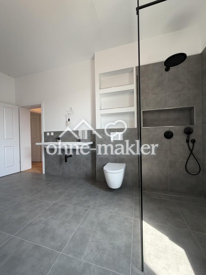 Exklusiver Erstbezug - Stilvolle 4-Zimer-Altbauwohnung in zentraler Lage - Photo 5