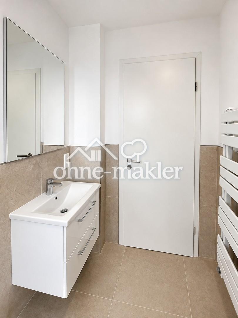 Erstbezug: Moderne Dachgeschosswohnung mit Klimaanlage, Einbauküche und Panoramablick - Foto 3