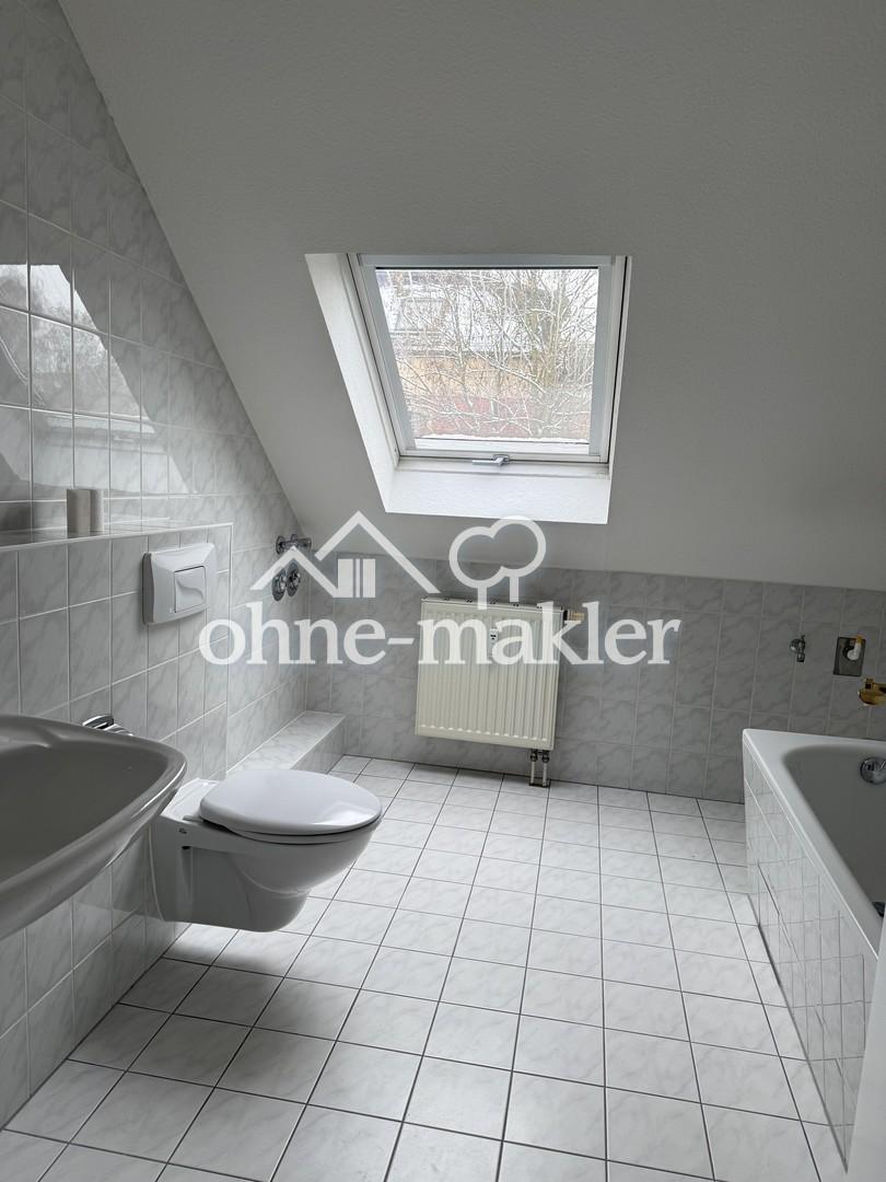 Schöne, zentral gelegene und helle DG-Wohnung - Foto 3