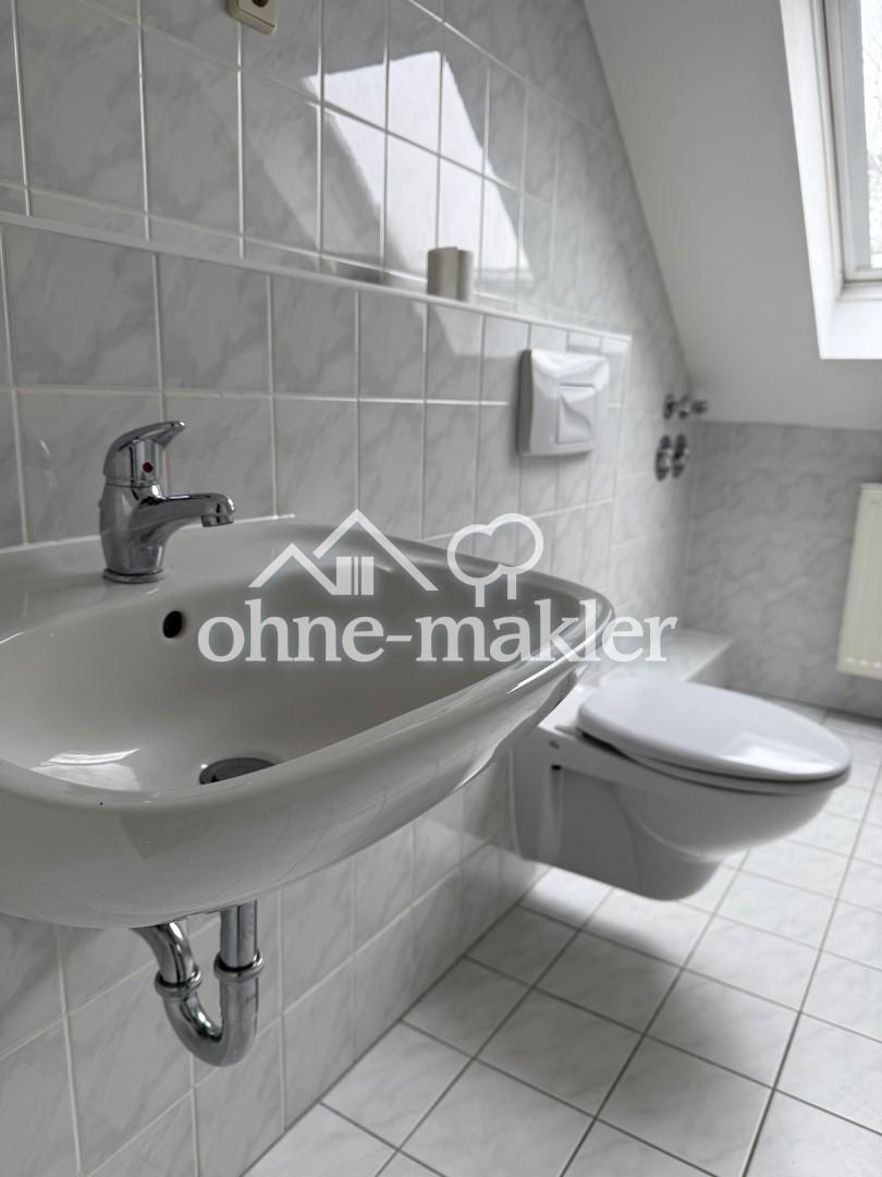 Schöne, zentral gelegene und helle DG-Wohnung - Foto 4