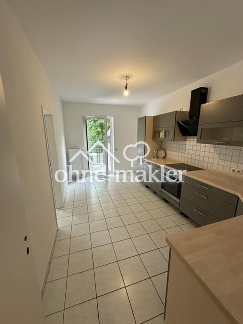 Modernisierte 3-Zimmer-Erdgeschosswohnung mit Garten, Terrasse und zwei Stellplätzen - Foto 3