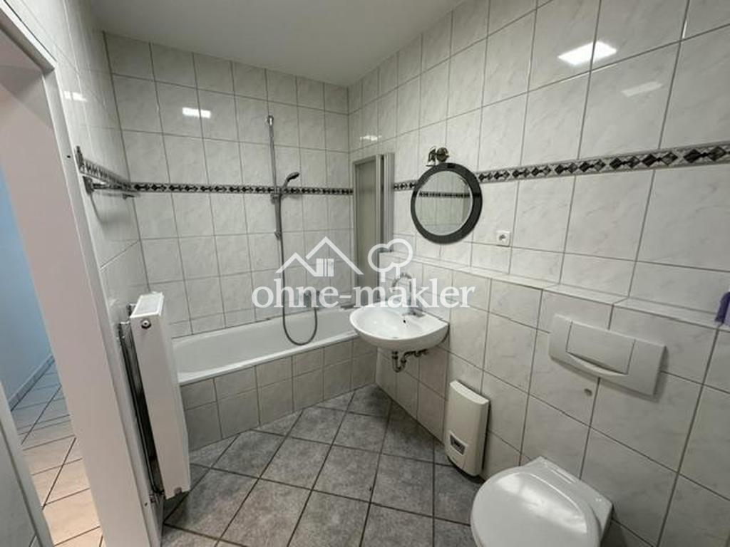 Modernisierte 3-Zimmer-Erdgeschosswohnung mit Garten, Terrasse und zwei Stellplätzen - Foto 4