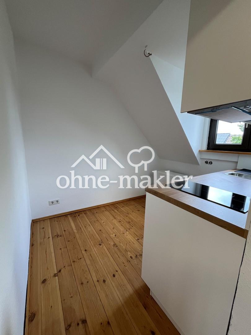 Charmante Dachgeschosswohnung mit neuer Einbauküche – ruhige Lage in Heiligenhaus - Foto 2