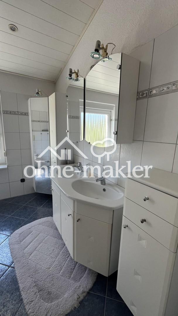 Großzügige 5-Zimmer-Wohnung mit Garten, Terrasse und Garage - Foto 4