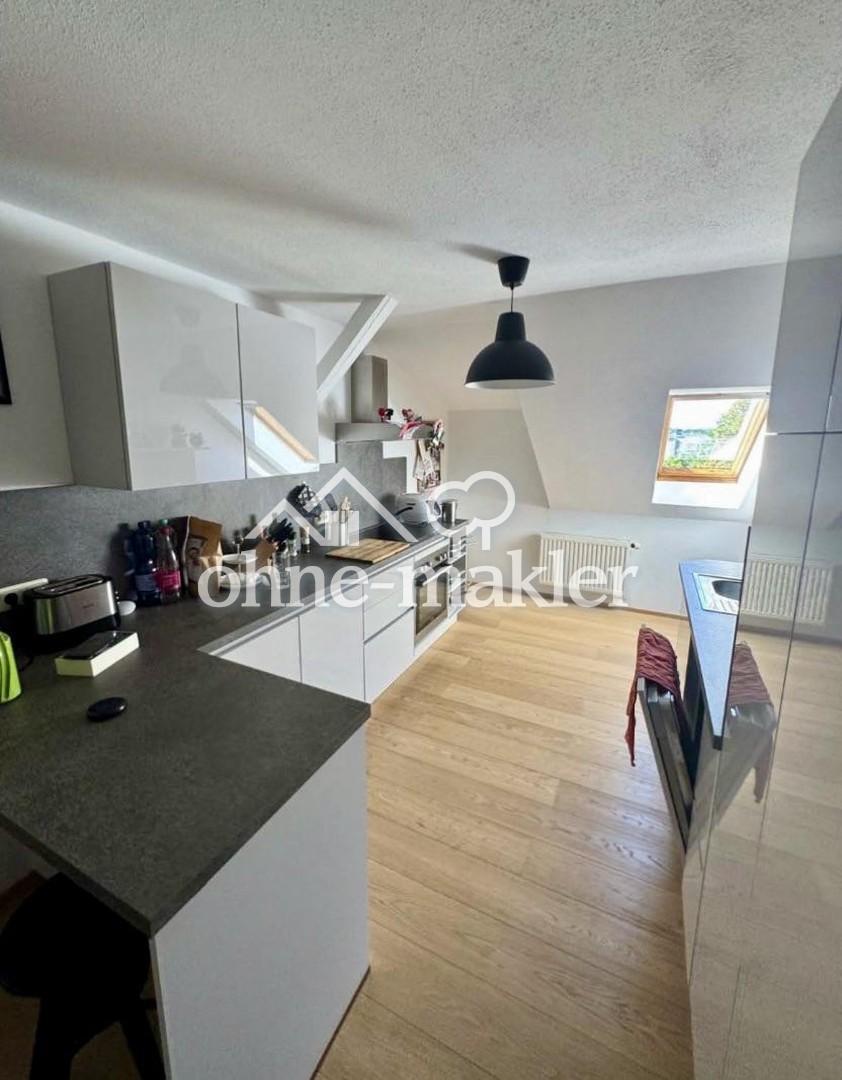 Sanierte 2-Zimmer-Dachgeschosswohnung mit Einbauküche - Photo 3