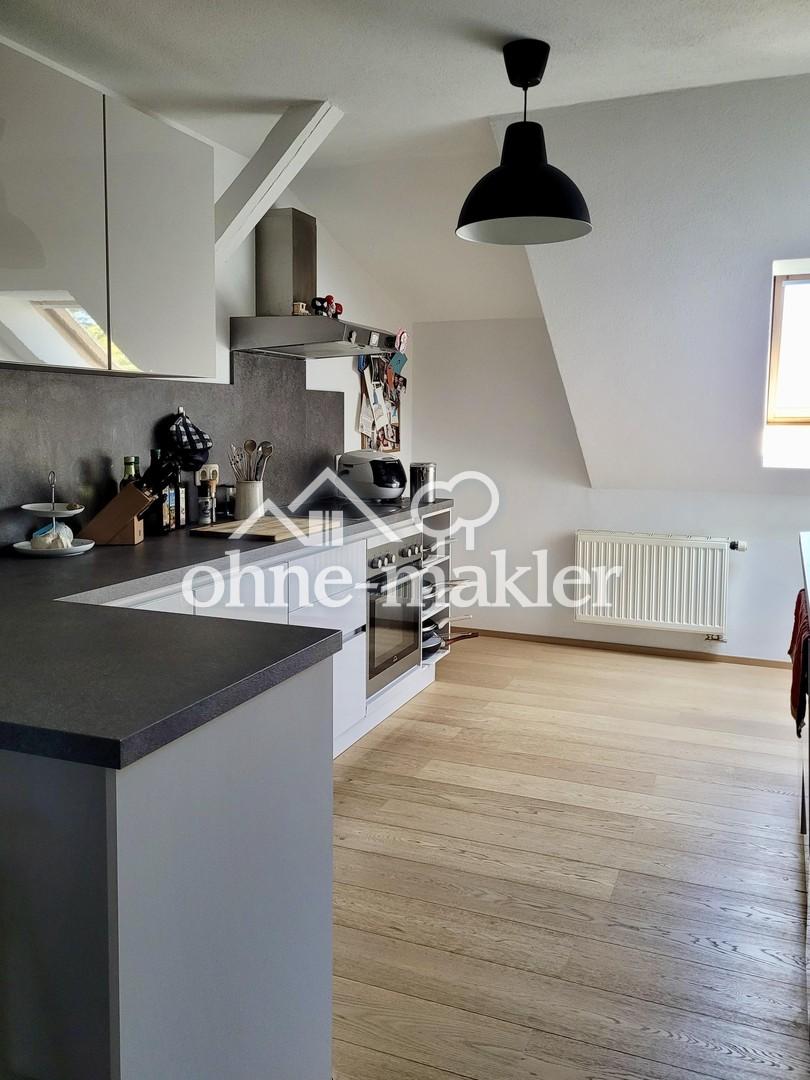 Sanierte 2-Zimmer-Dachgeschosswohnung mit Einbauküche - Photo 4