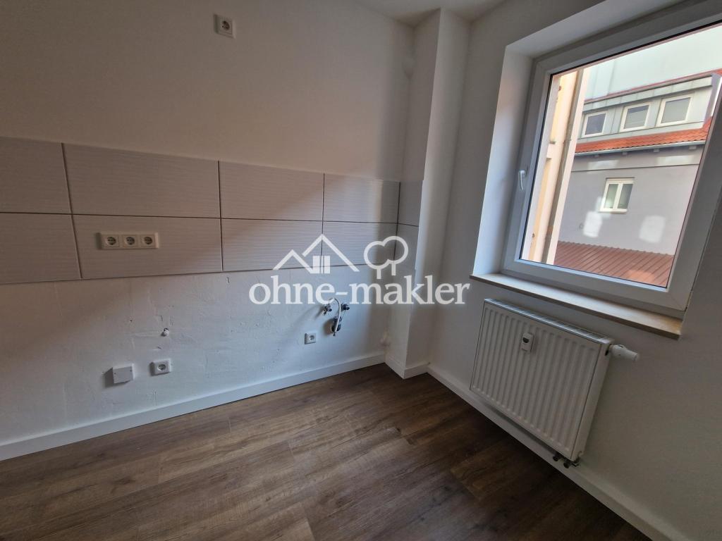 Gepflegte 2-Zimmer-Wohnung mit Tageslichtbad in Nürnberg - Foto 2