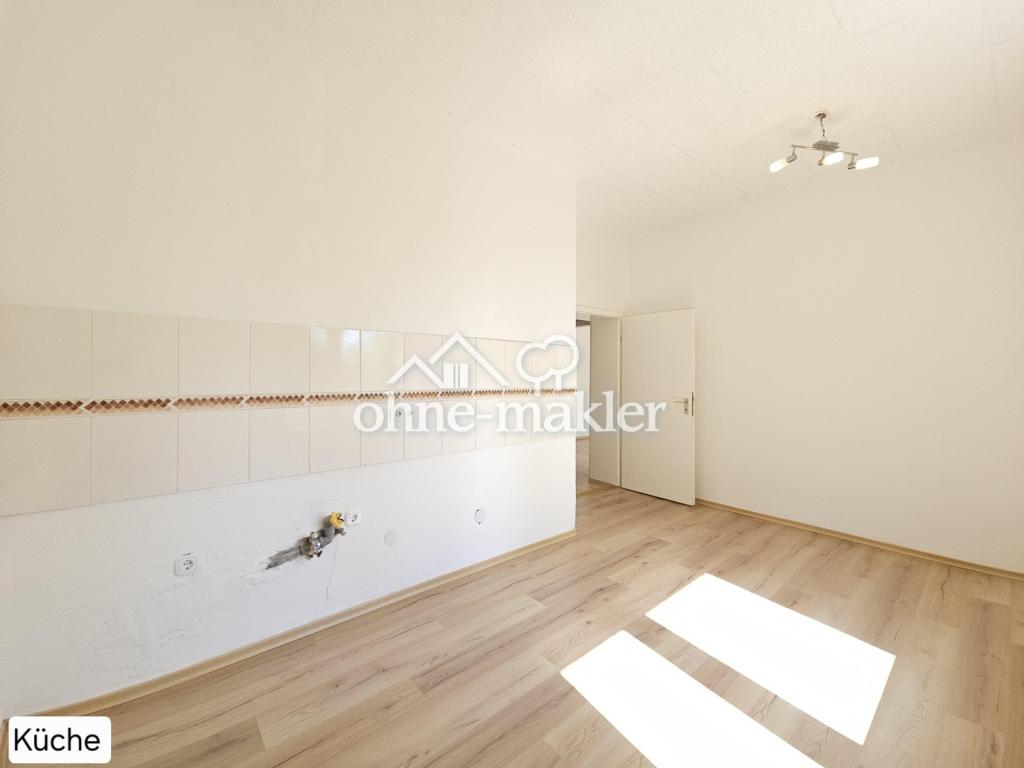 Frisch renovierte 3-Zimmer-Wohnung mit neuem Laminatboden in ruhiger & zentraler Lage - Foto 4