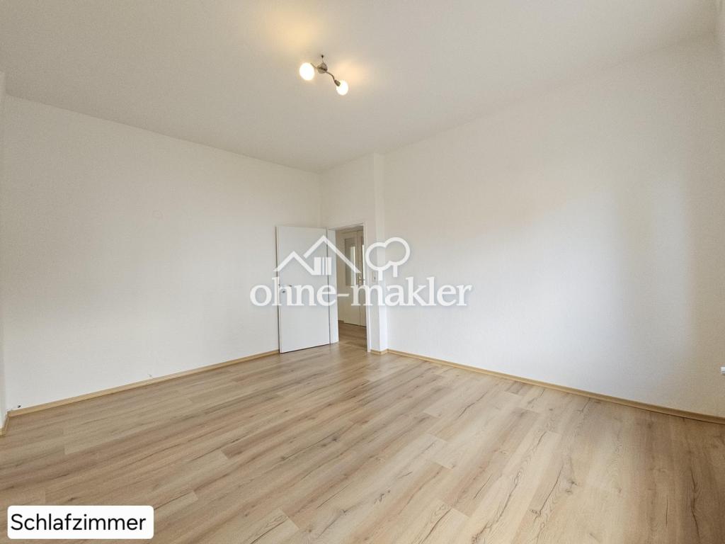 Frisch renovierte 3-Zimmer-Wohnung mit neuem Laminatboden in ruhiger & zentraler Lage - Foto 3