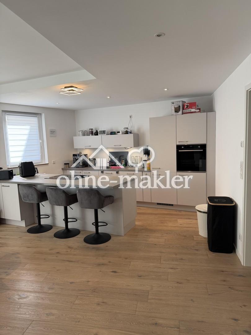 Hochwertige 2-Zimmer-Erdgeschosswohnung auf der Haardt – KfW-55, A+, 2x Stellplatz, Einbauküche - Foto 4