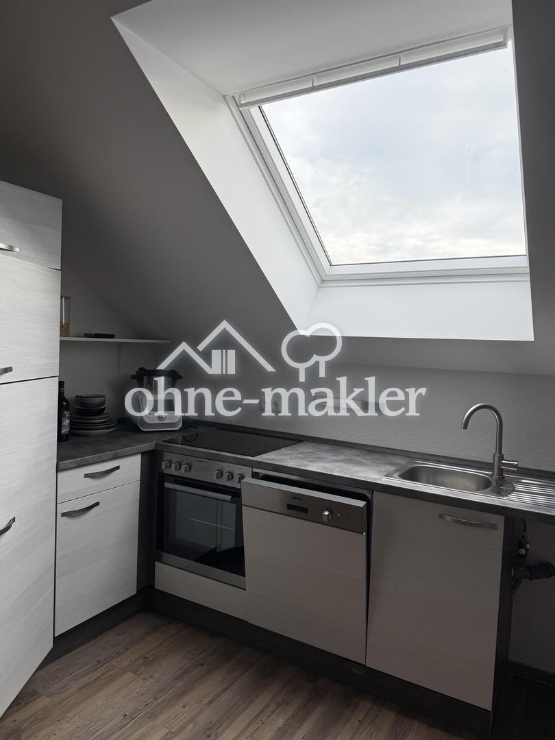 Lichtdurchflutete Dachgeschosswohnung mit Balkon und Aufzug - Foto 1
