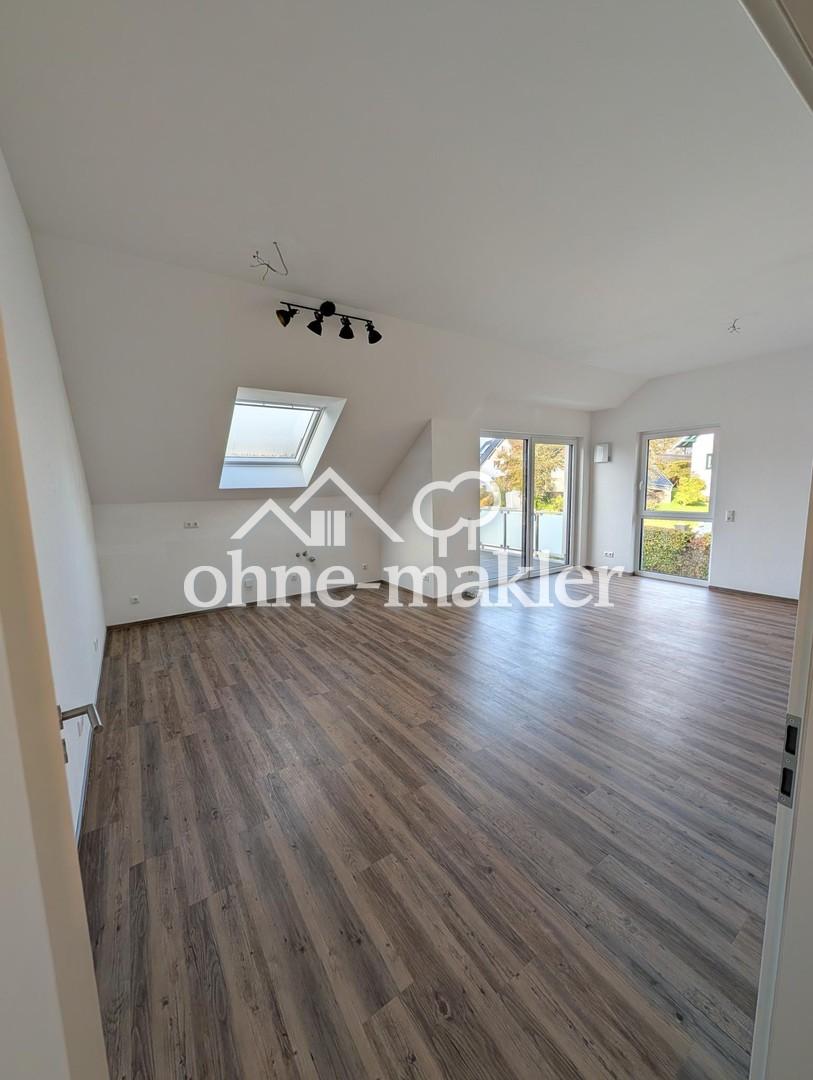 Lichtdurchflutete Dachgeschosswohnung mit Balkon und Aufzug - Foto 1