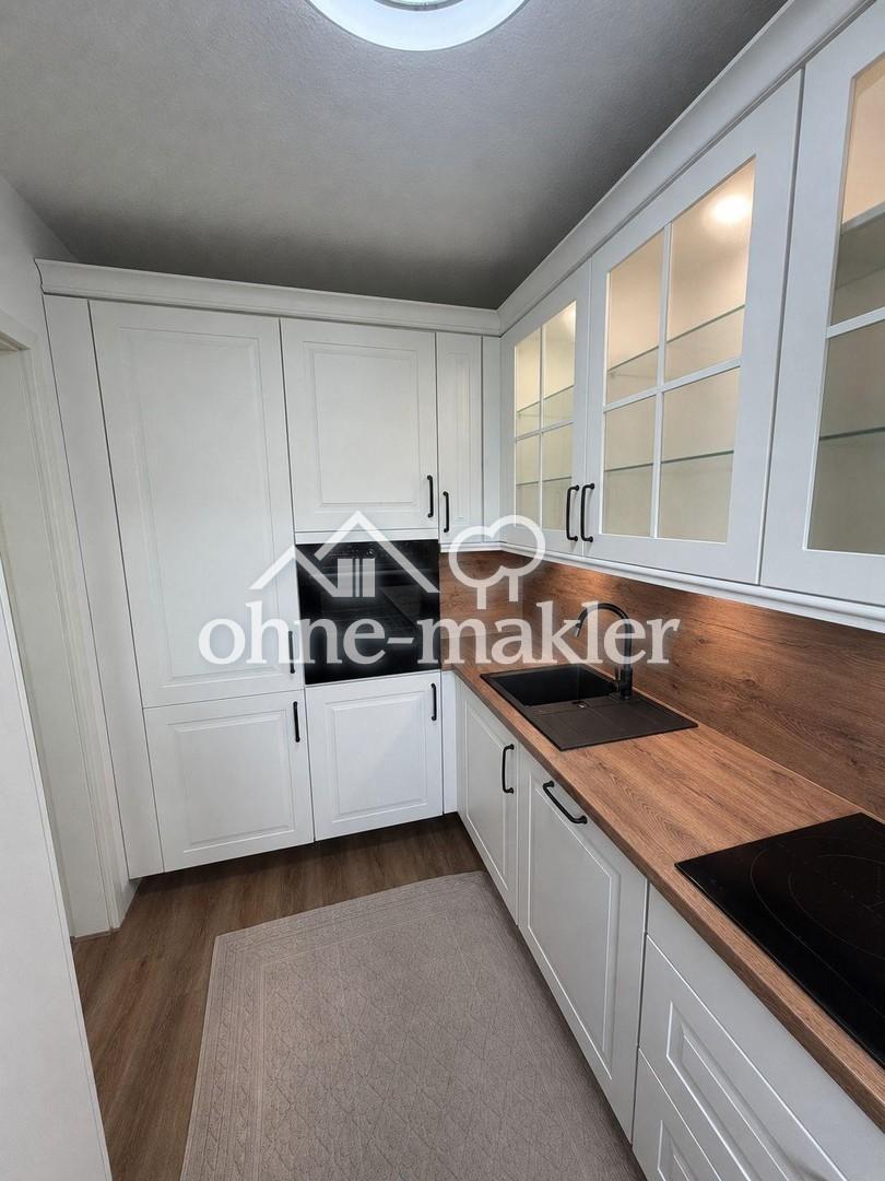 Exklusive 4-Zimmer-Wohnung mit großzügiger Terrasse, Balkon und Tiefgaragenstellplatz in bester Lage - Photo 5