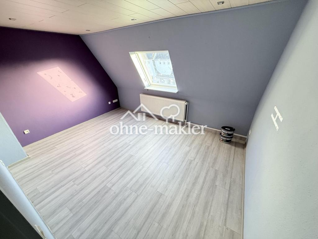 Moderne Eleganz: Stilvoll modernisierte Dachgeschosswohnung in bester Lage - Photo 4