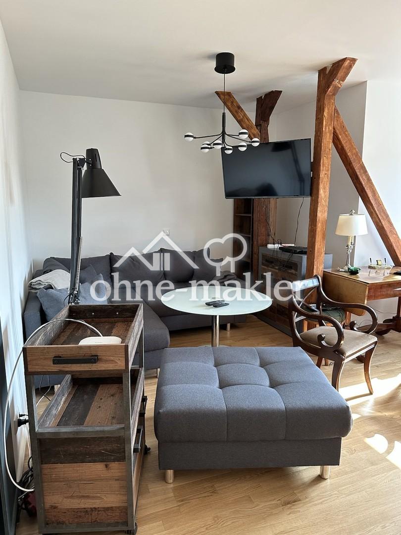 Einzimmerwohnung im Dachgeschoss, EBK, Fußbodenheizung im Duschbad - Foto 1