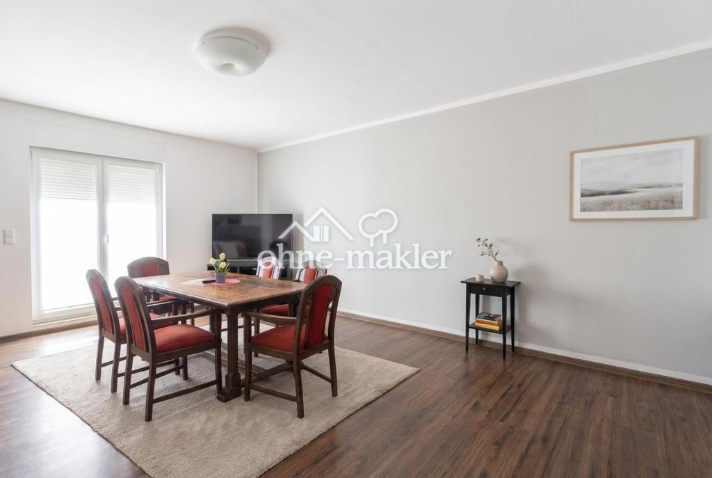 Helle 3-Zimmer-Erdgeschosswohnung mit Terrasse und EBK - ca. 110 m², neuwertig - Foto 1