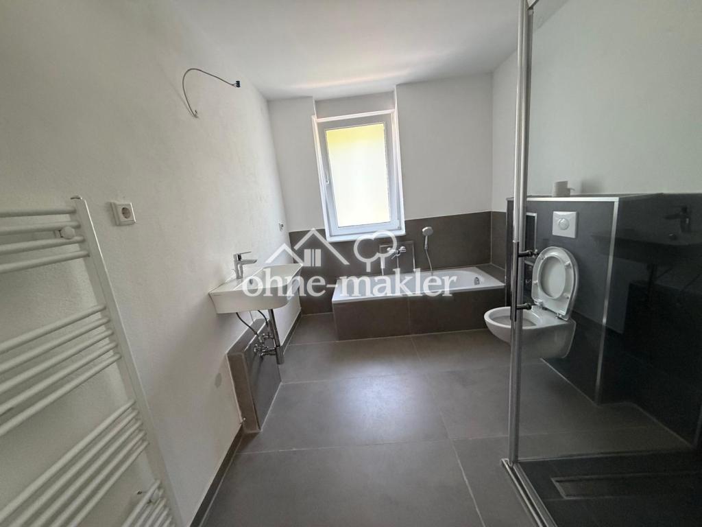 Erdgeschoß-Wohnung mit Gartennutzung und Terrasse Neubau - Photo 4