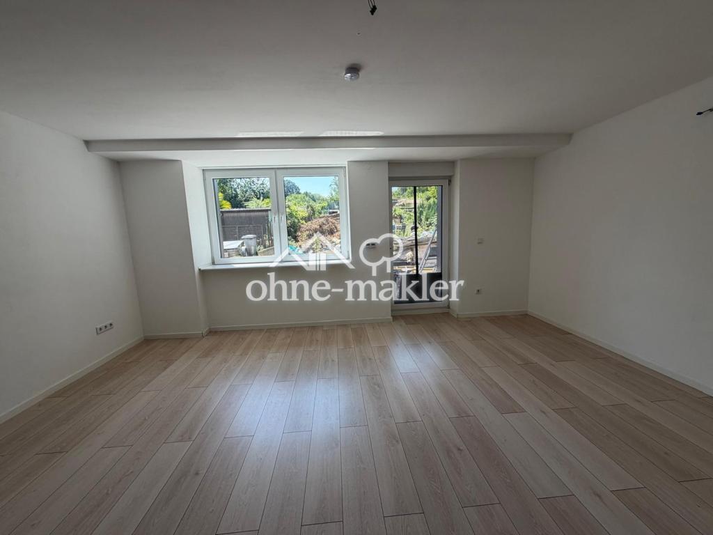 Erdgeschoß-Wohnung mit Gartennutzung und Terrasse Neubau - Photo 2