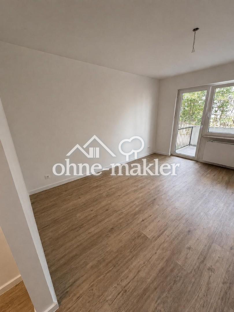 Apartment mit Balkon ins Grüne - Foto 1