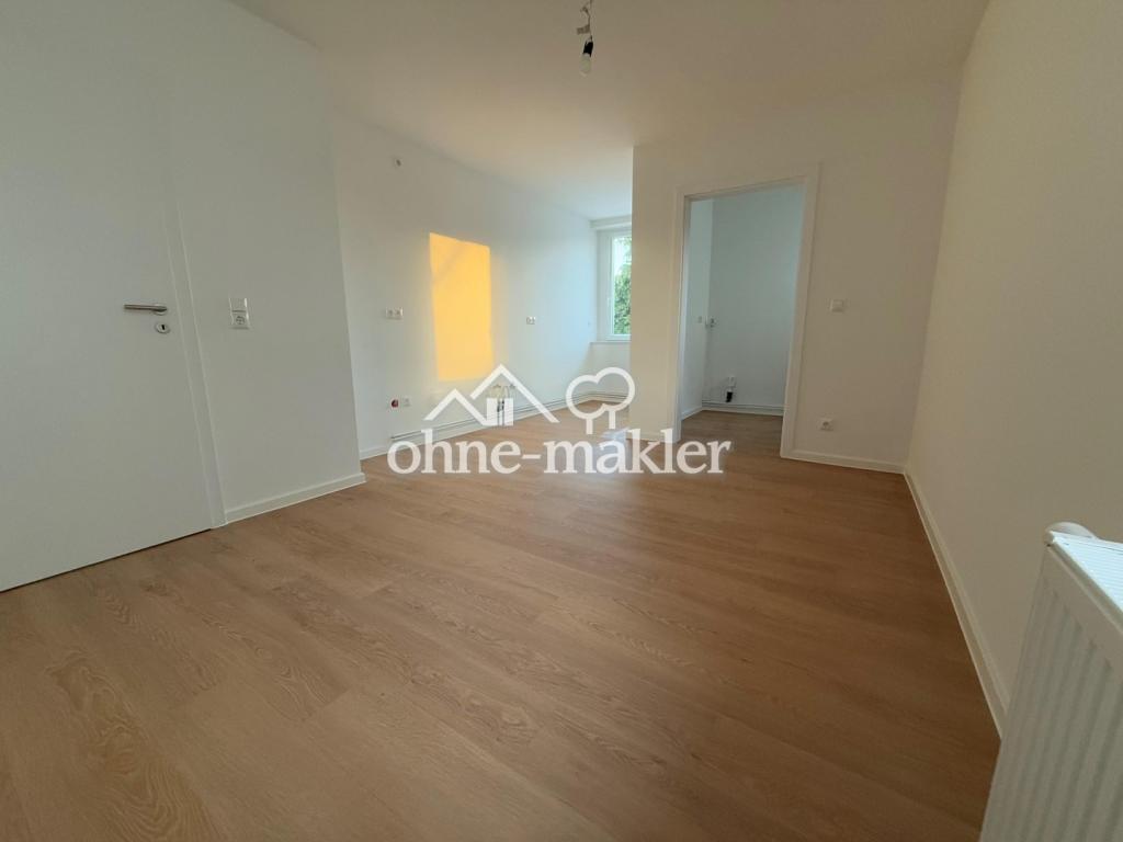 Sanierte 3-Zimmer-Wohnung mit Dachboden, Stellplatz und Gartenanteil - Foto 2