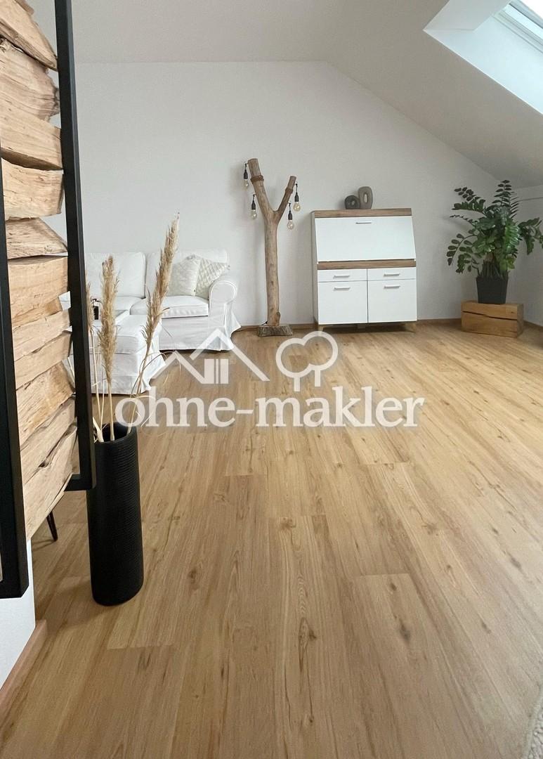 Stilvolle 3-Zimmer-Dachgeschosswohnung mit 32 m² Süd-Dachterrasse - Photo 2