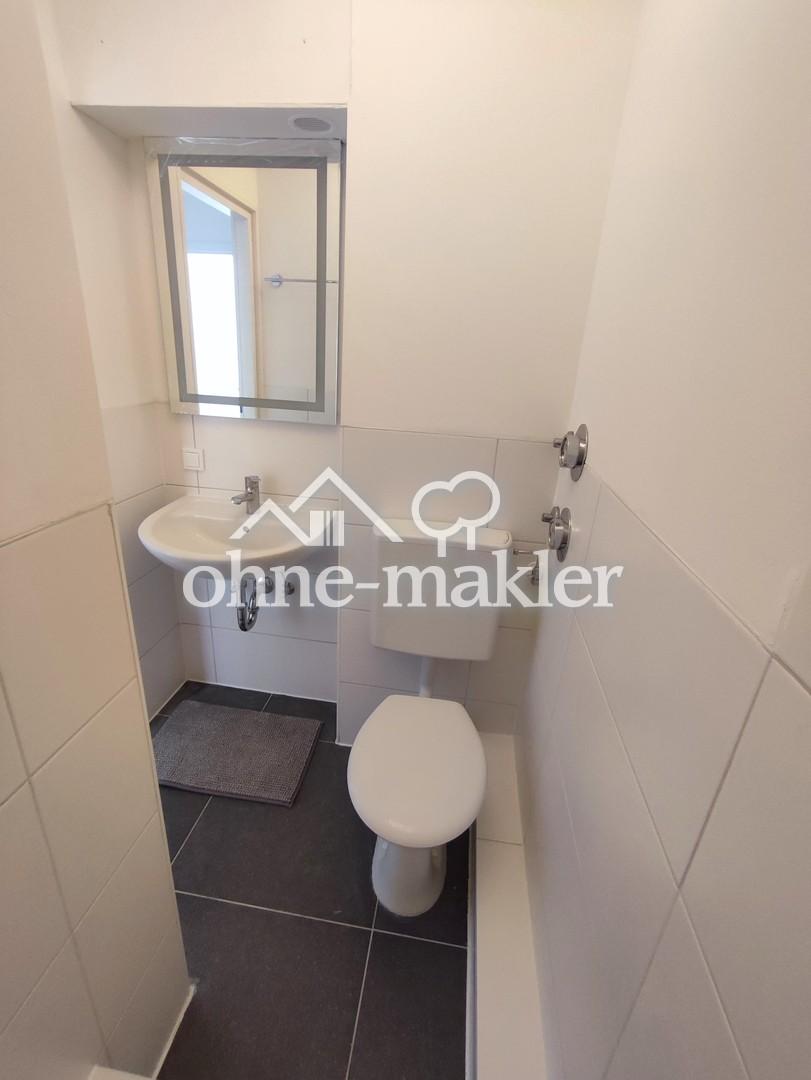 Erstbezug nach Sanierung: Helle 1,5 ZKB Souterrain in schönem Wohnumfeld - Photo 4