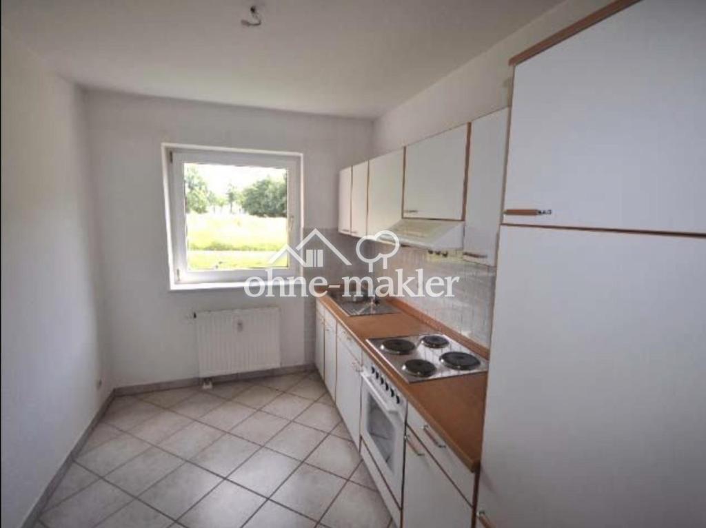 Sonnige Erdgeschosswohnung in Putbus mit Balkon und Einbauküche - Photo 4